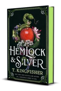 the cover of Hemlock and SIlver by T. Kingfisher has a red apple surrounded by snaking vegetation against a black background